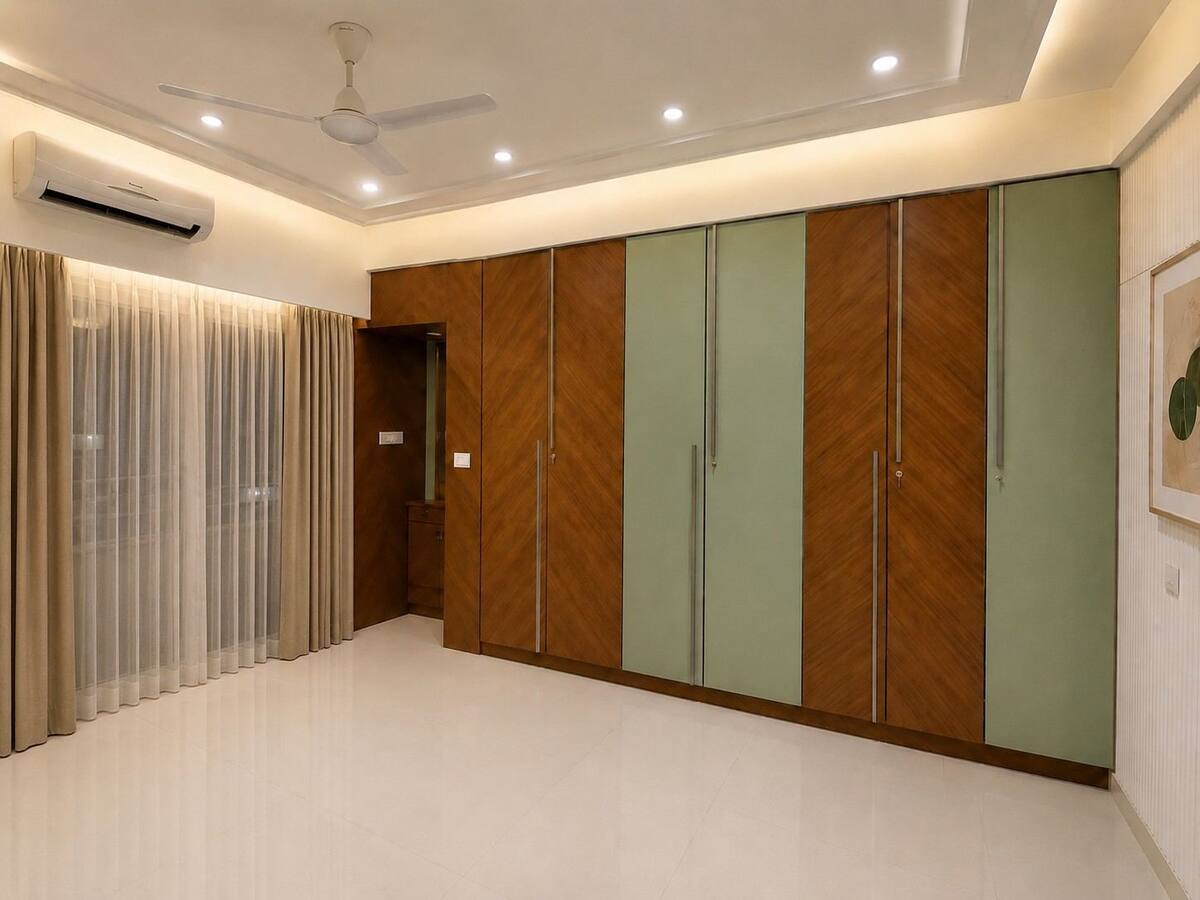 Ivory Towers bedroom wardrobe in walnut and mint-green