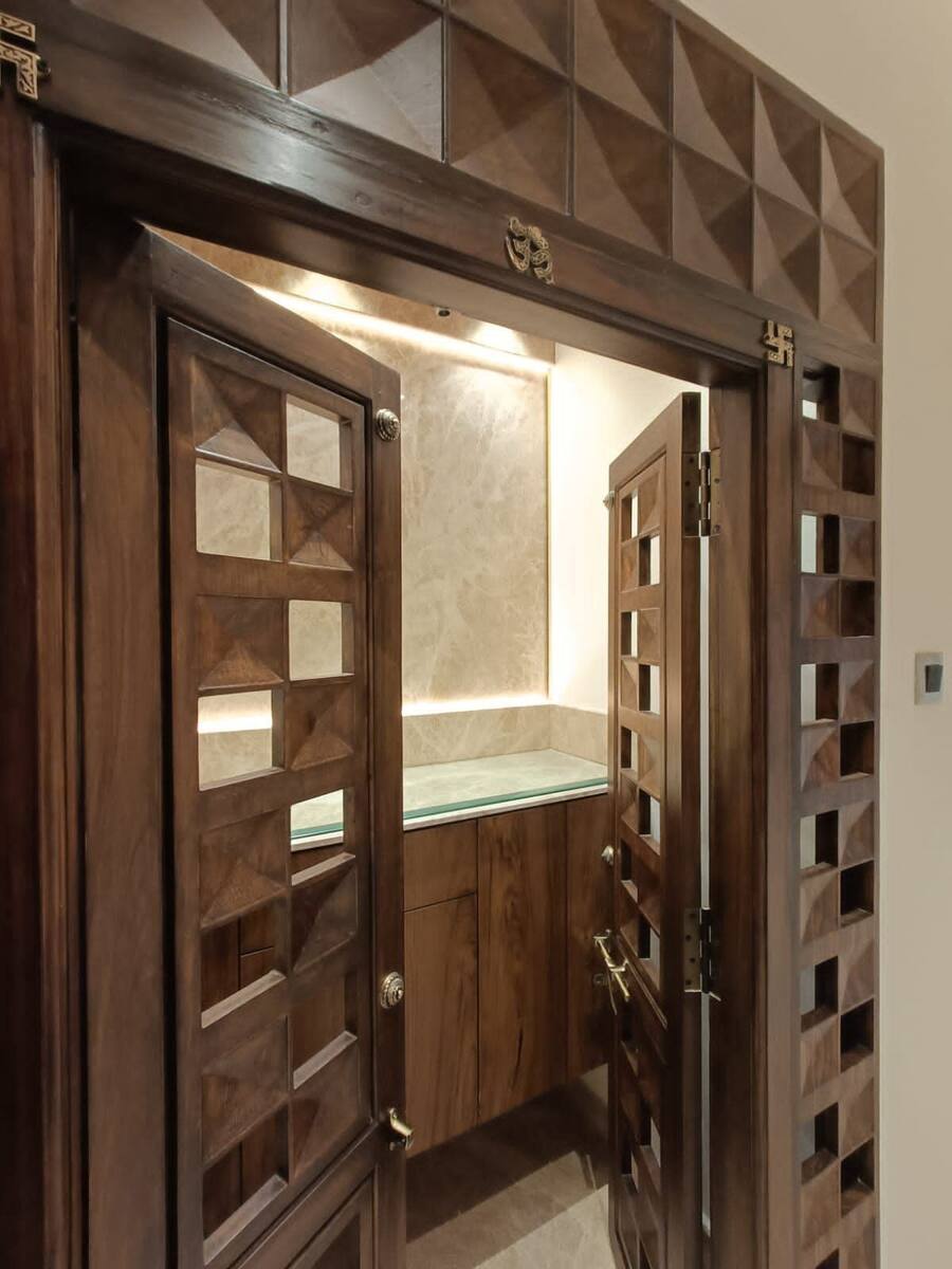 Vandeep Residence hand-carved pooja room doors