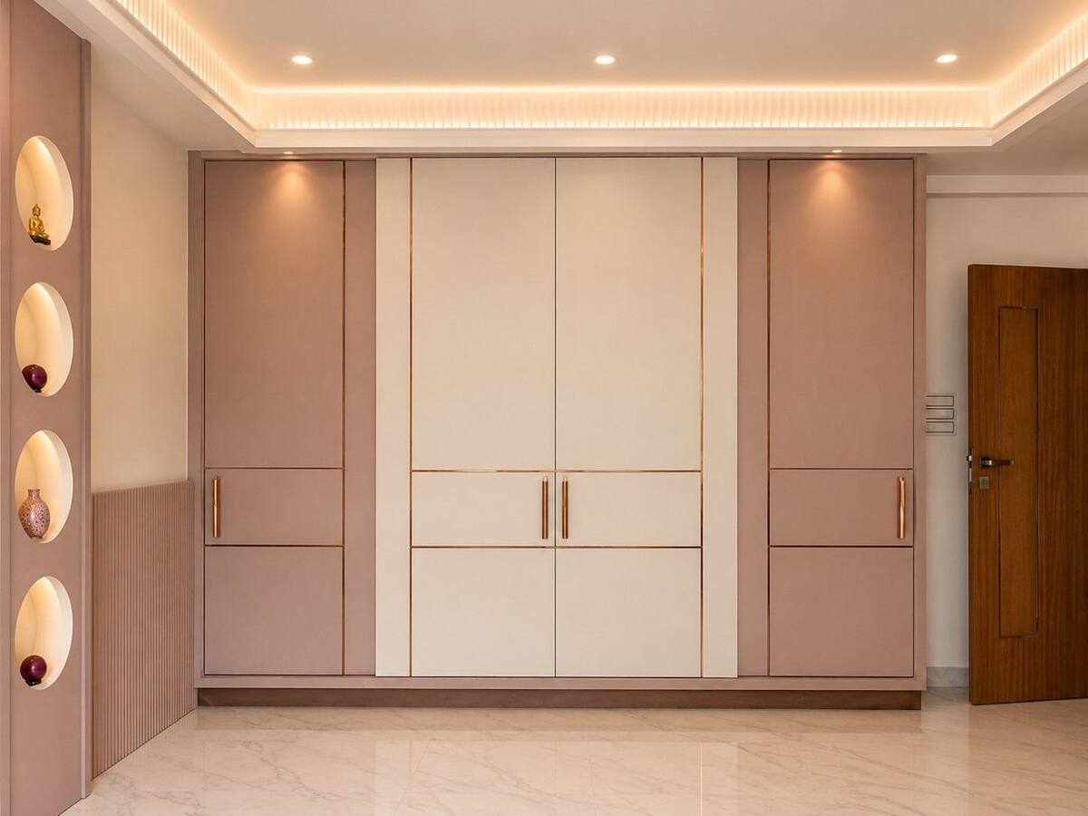 Menasgar Residence blush pink wardrobe with copper trim